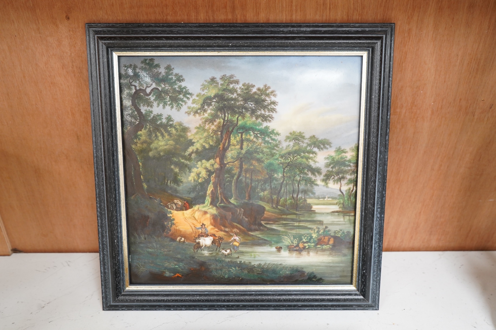 A Continental painted plaque with riverscape and a Royal Crown Derby floral panel, framed, largest overall 24cm high